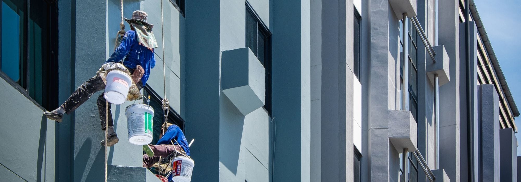 Rope access services in Singapore for external wall painting